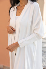 Load image into Gallery viewer, The White Orange Crepe Abaya with Buttoned Cuff Detail - Fabric Made from Orange Peel
